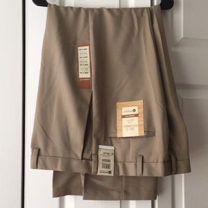 Brand new. Men’s dress up pants 36W X 30L